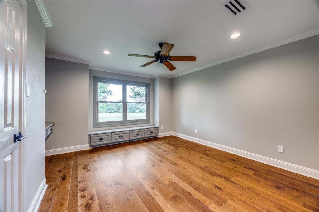 3244 Joe Davis Road Whitewright, TX 75491 - Photo 17 of 28 Unfurnished room featuring wood-type flooring, ceiling fan, crown molding, and recessed lighting