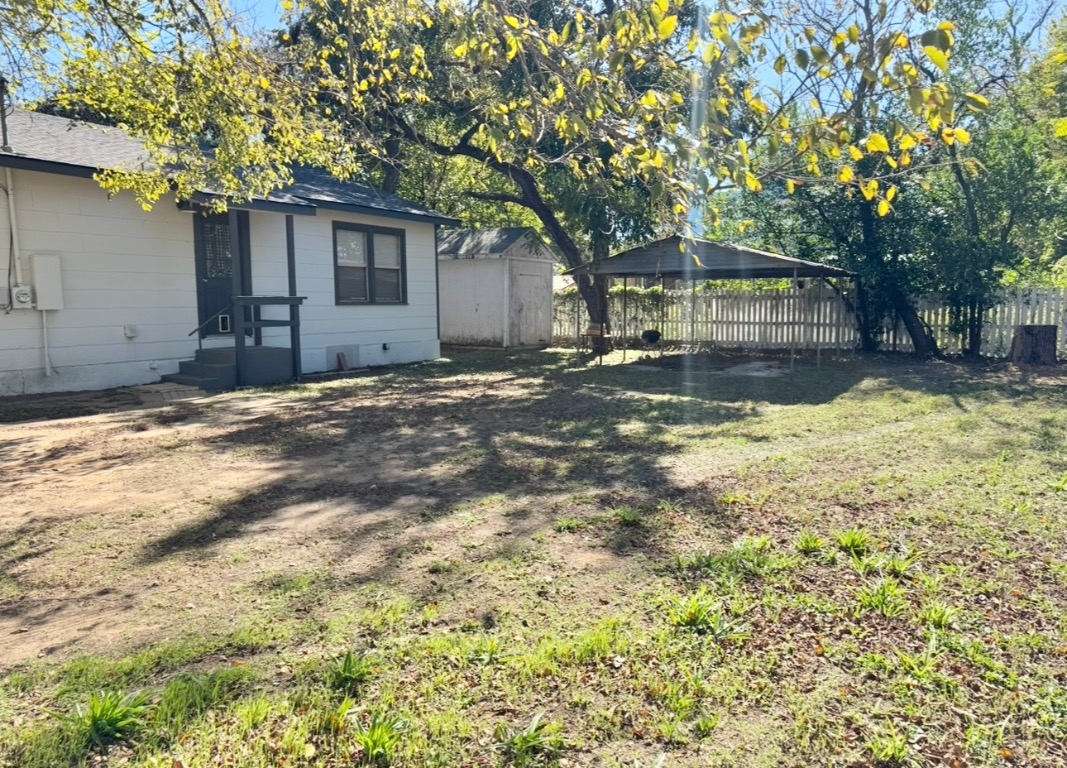 110 East 8th Street Elgin, TX 78621 - Photo 17 of 17 a view of a house with a yard