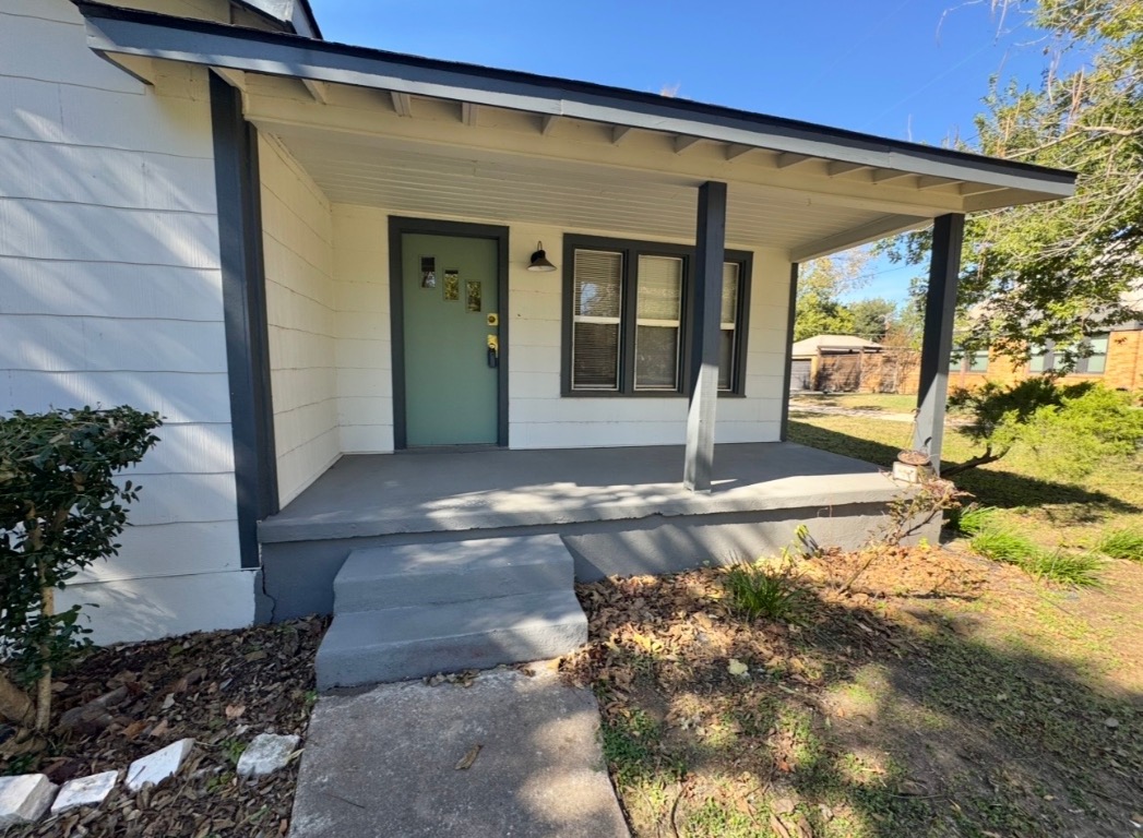 110 East 8th Street Elgin, TX 78621 - Photo 3 of 17 a front view of a house with a yard