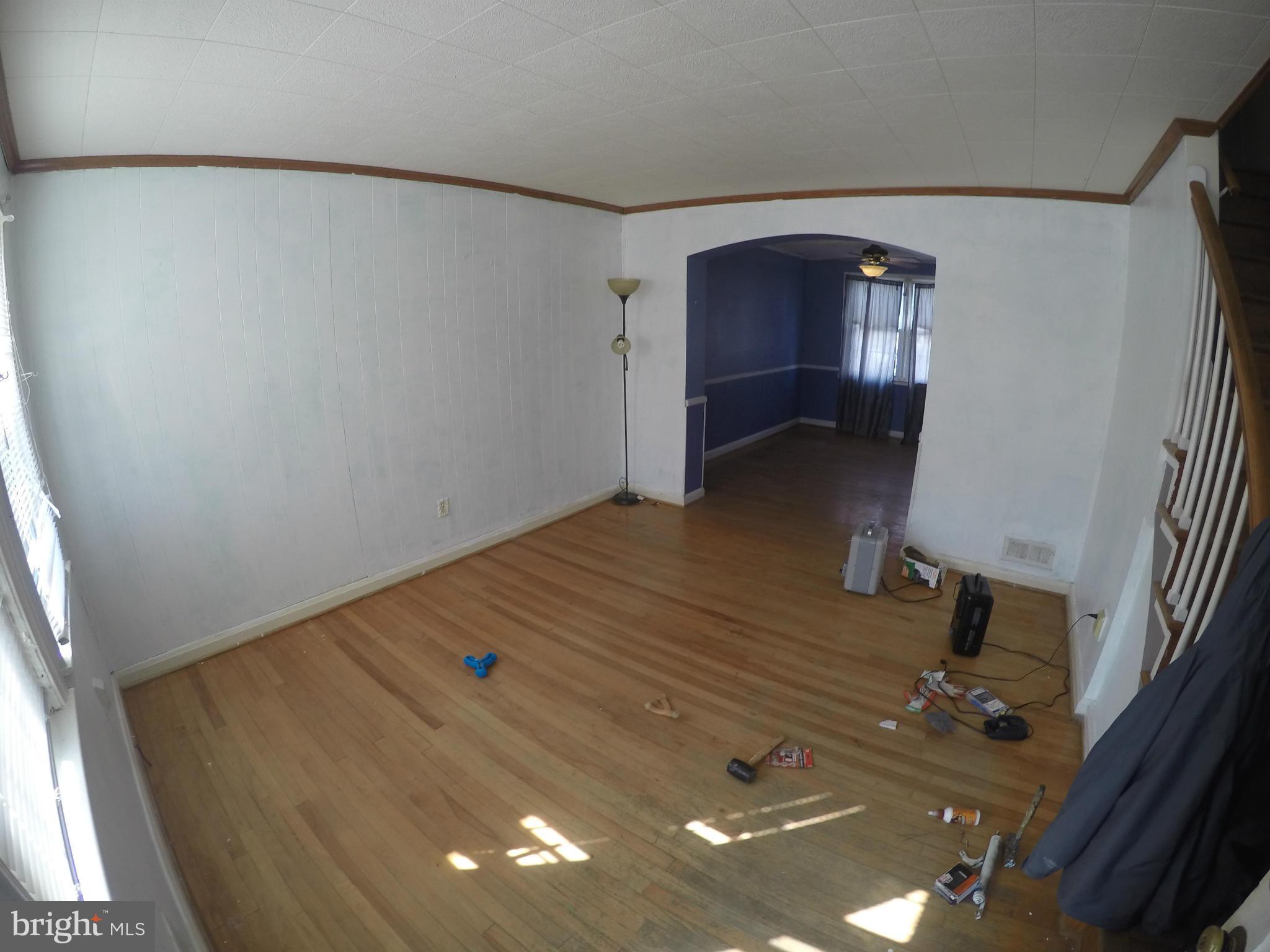 8326 Edgedale Road Baltimore, MD 21234 - Photo 2 of 9 a view of livingroom with hardwood floor