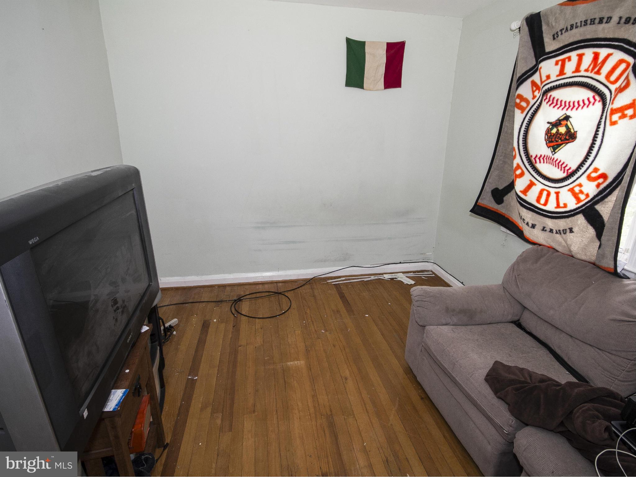 8326 Edgedale Road Baltimore, MD 21234 - Photo 6 of 9 a view of room with furniture and a window