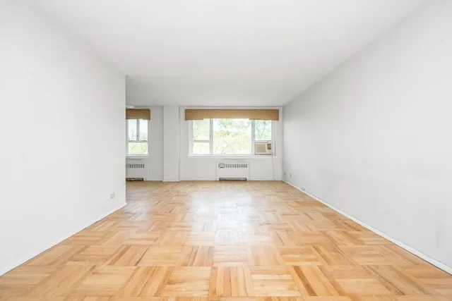 a view of an empty room and window