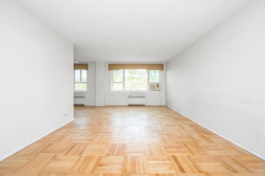 5355 Henry Hudson Parkway West, Unit 5C Bronx, NY 10471 - Photo 3 of 13 a view of an empty room and window