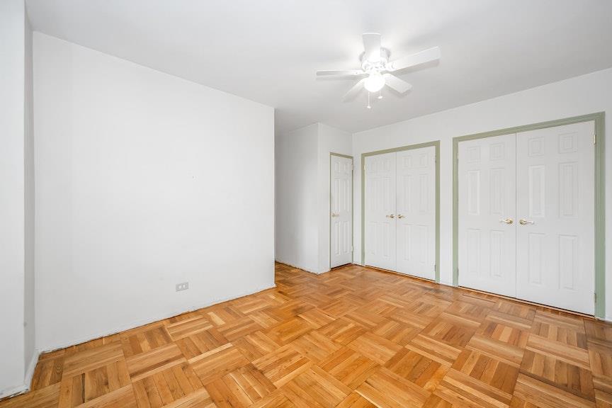 5355 Henry Hudson Parkway West, Unit 5C Bronx, NY 10471 - Photo 10 of 13 a view of a room with a ceiling fan