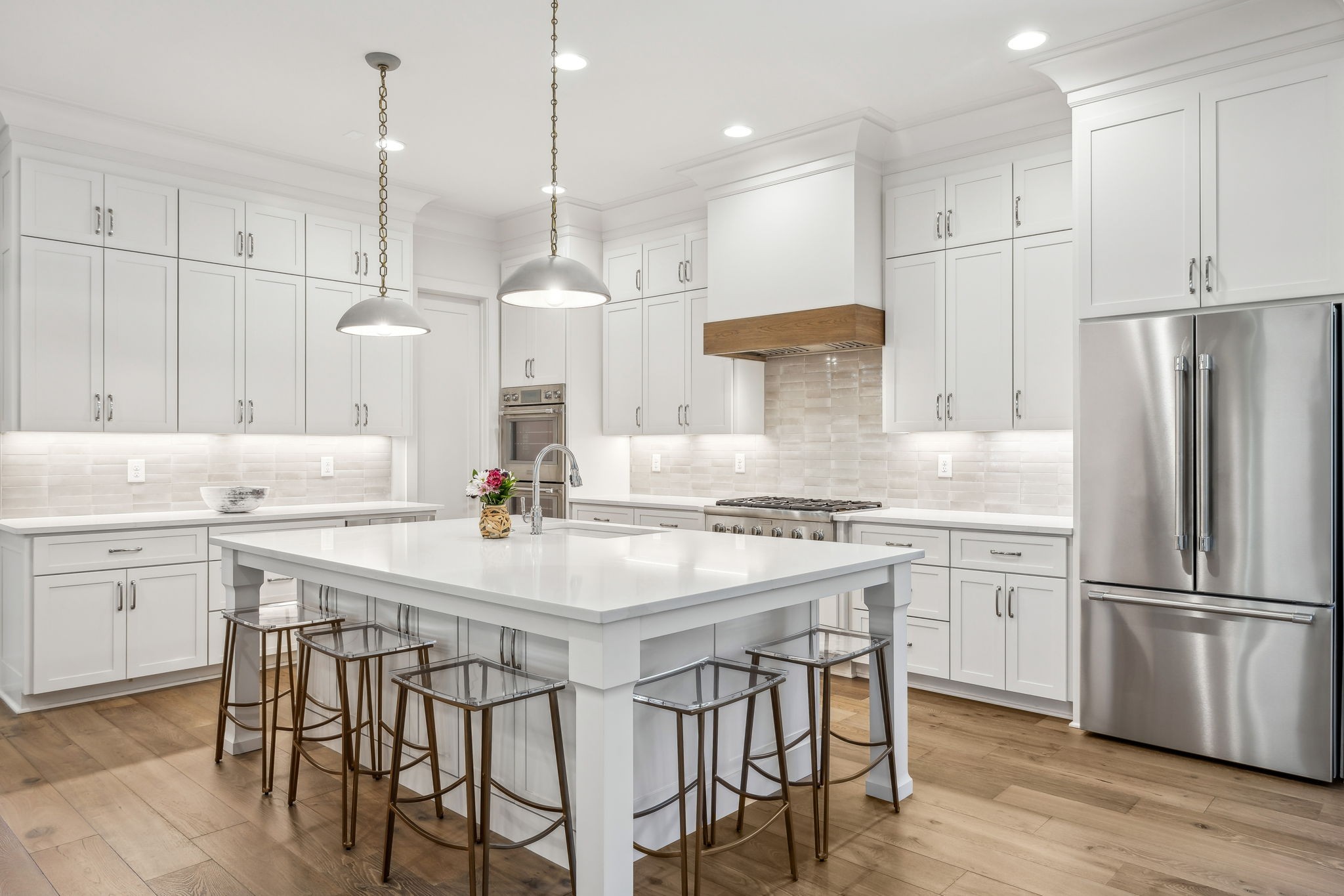 1013 William Street Franklin, TN 37064 - Photo 16 of 49 a kitchen with kitchen island granite countertop a sink a center island and stainless steel appliances