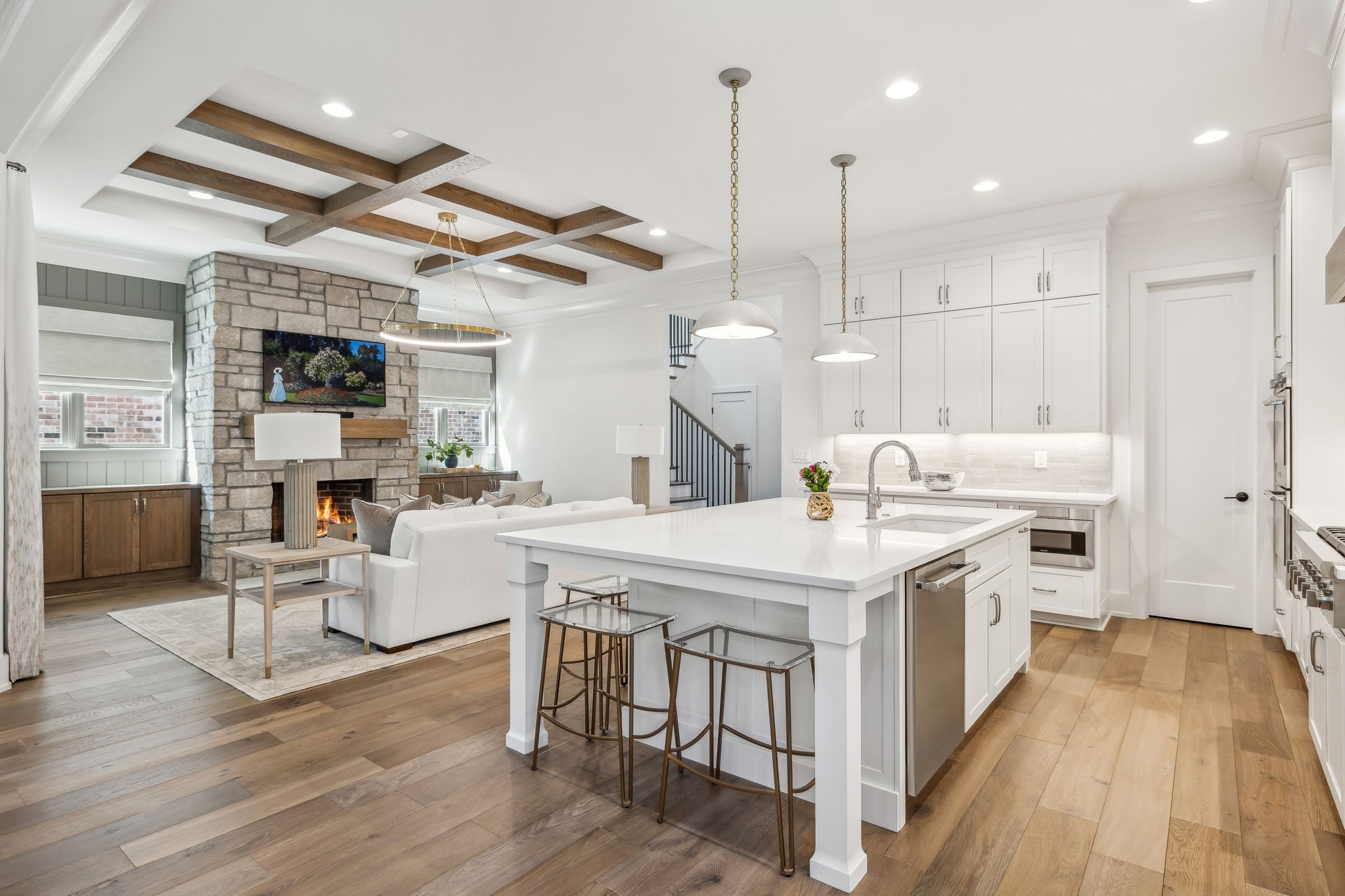 1013 William Street Franklin, TN 37064 - Photo 20 of 49 a large kitchen with stainless steel appliances kitchen island a large island a stove a table and chairs in it