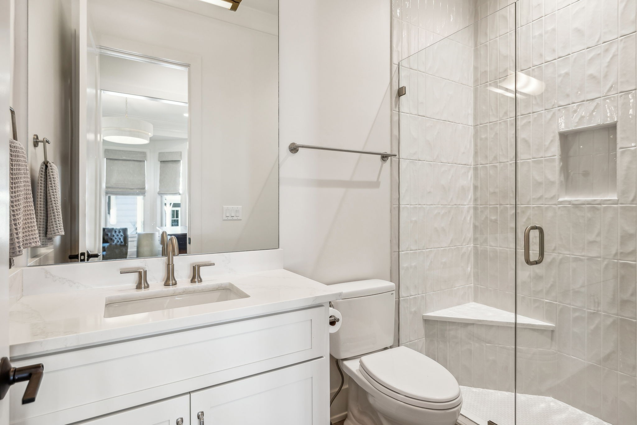 1013 William Street Franklin, TN 37064 - Photo 32 of 49 a bathroom with a sink toilet vanity and shower