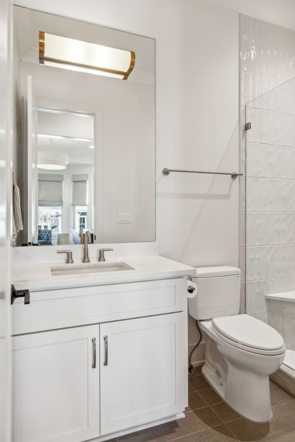 1013 William Street Franklin, TN 37064 - Photo 33 of 49 a bathroom with a sink a toilet a mirror and vanity