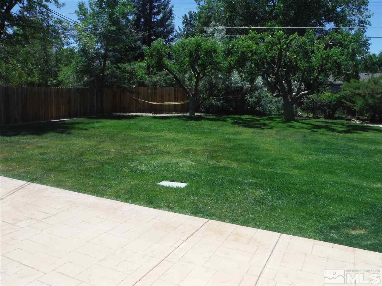 675 Robin Street Reno, NV 89509 - Photo 6 of 7 a view of backyard with green space