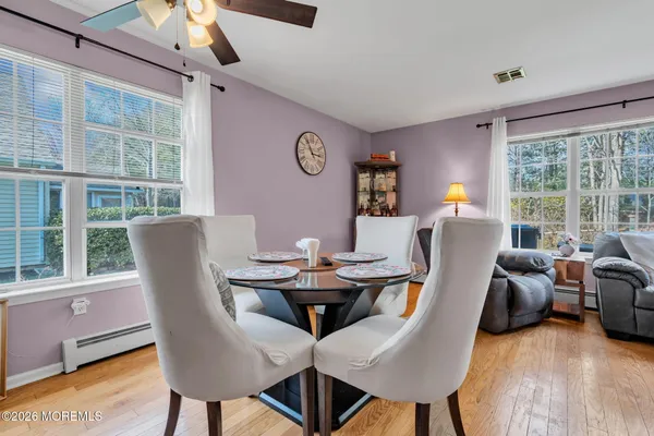 a view of a dining room with furniture window and outside view