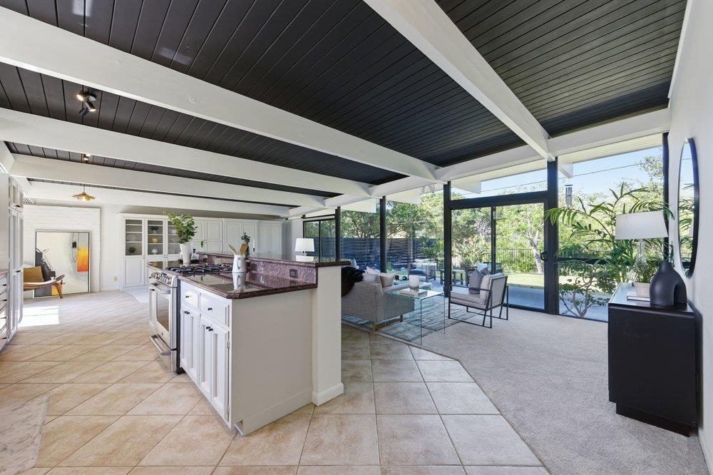 2203 Allegheny Way San Mateo, CA 94402 - Photo 3 of 56 a view of a patio with dining table and chairs