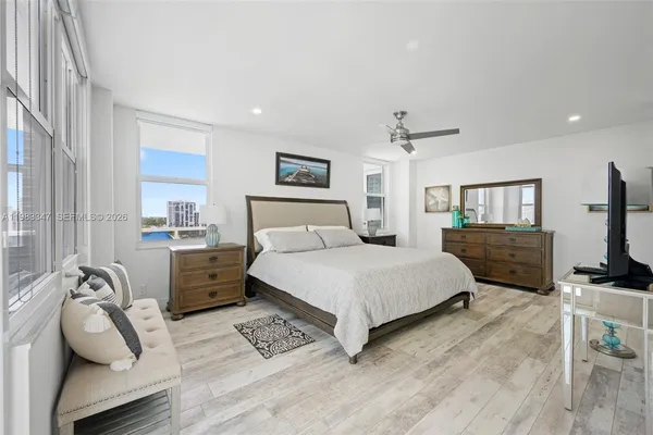 a bedroom with a bed and furniture