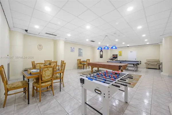 a view of a dining room with furniture