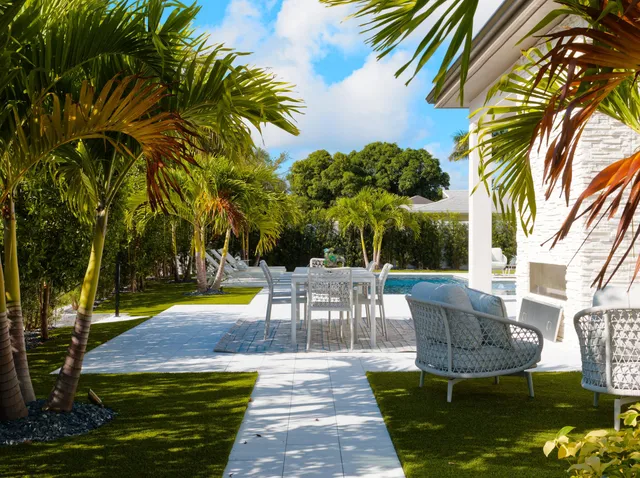 a view of a swimming pool with a patio