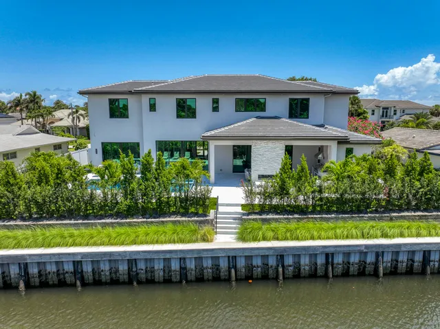 a view of swimming pool with outdoor seating and yard