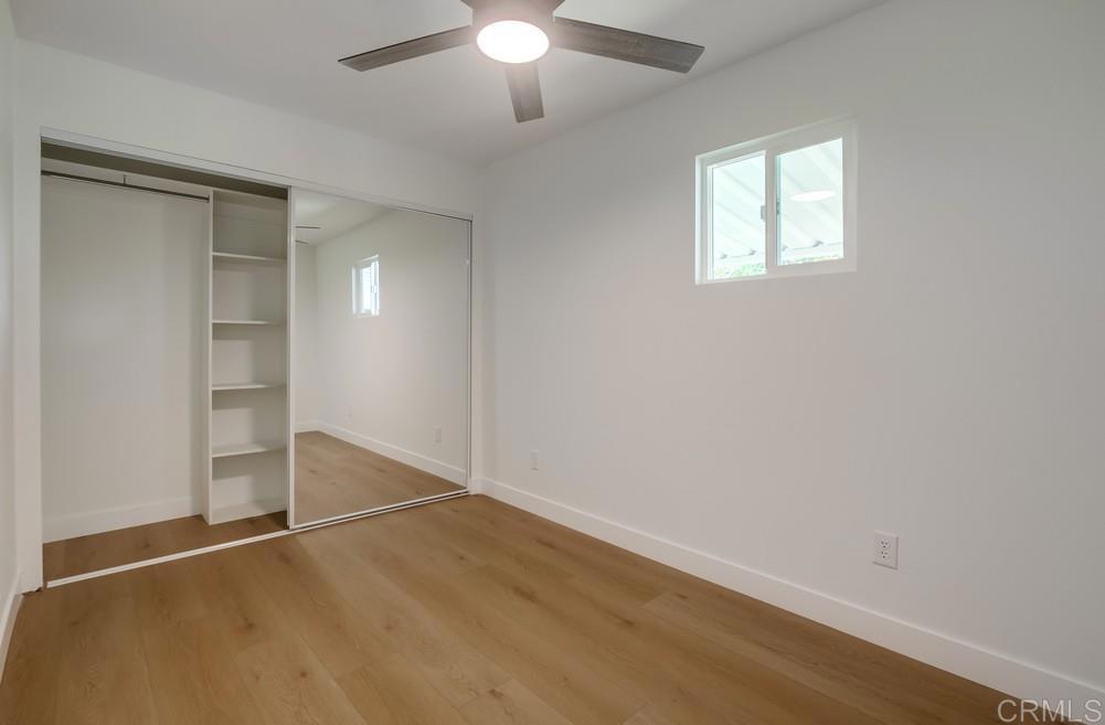 8301 Mission Gorge Road, Unit 331 Santee, CA 92071 - Photo 13 of 17 an empty room with closet and windows