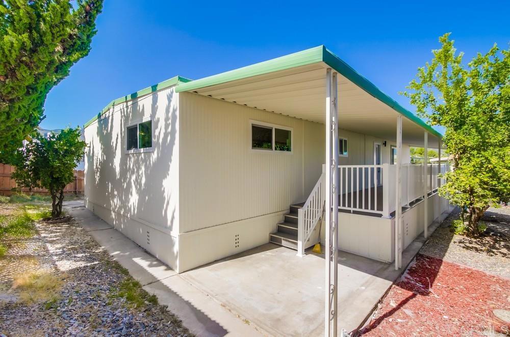8301 Mission Gorge Road, Unit 331 Santee, CA 92071 - Photo 17 of 17 a view of a house with a yard