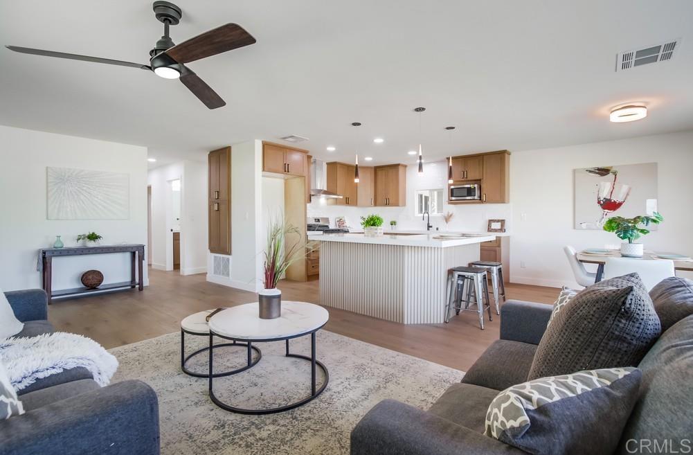 8301 Mission Gorge Road, Unit 331 Santee, CA 92071 - Photo 5 of 17 a living room with furniture and kitchen view