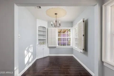 a view of livingroom with hardwood floor and window