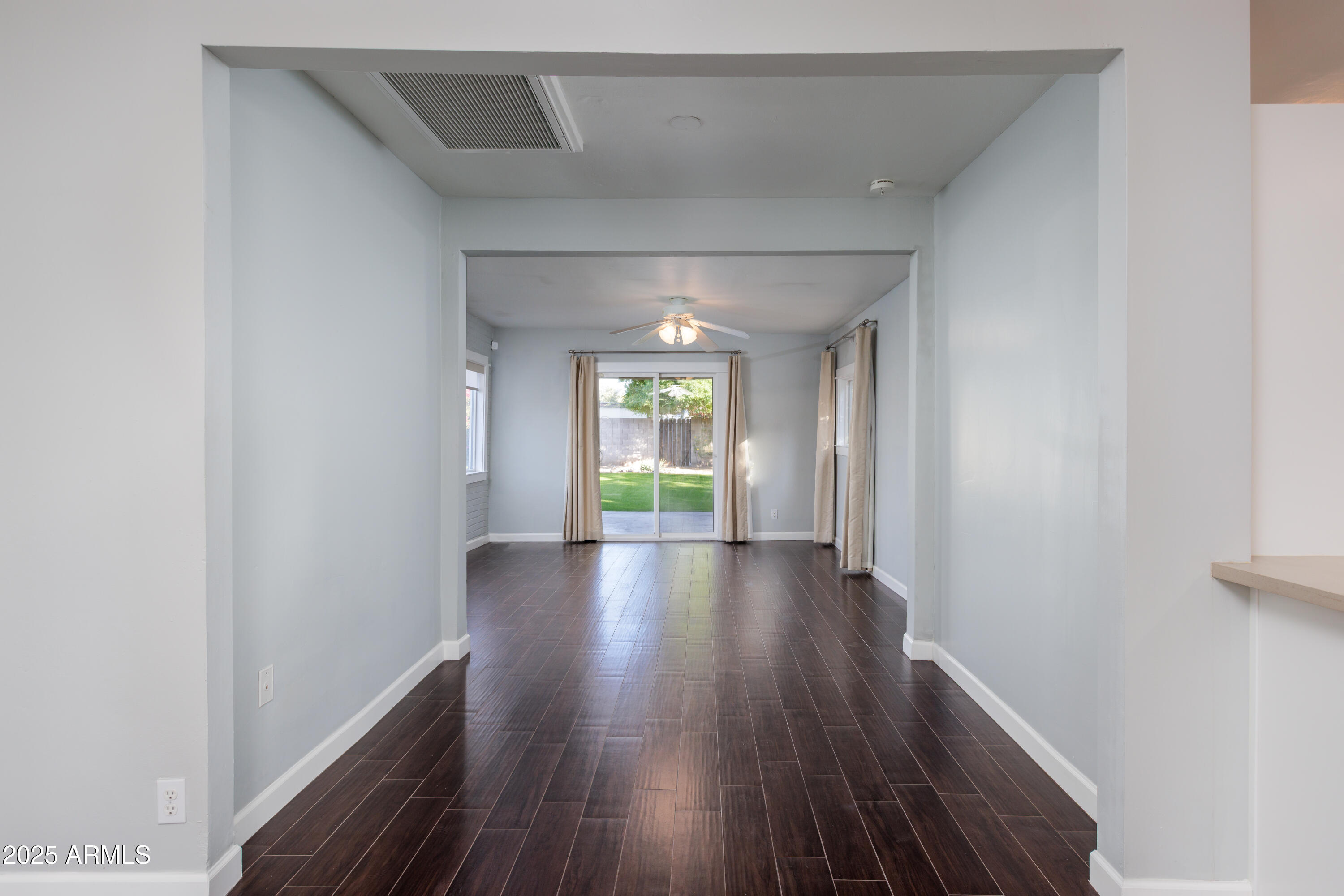 1621 North 16th Avenue Phoenix, AZ 85007 - Photo 17 of 32 a view of livingroom with hardwood floor and window