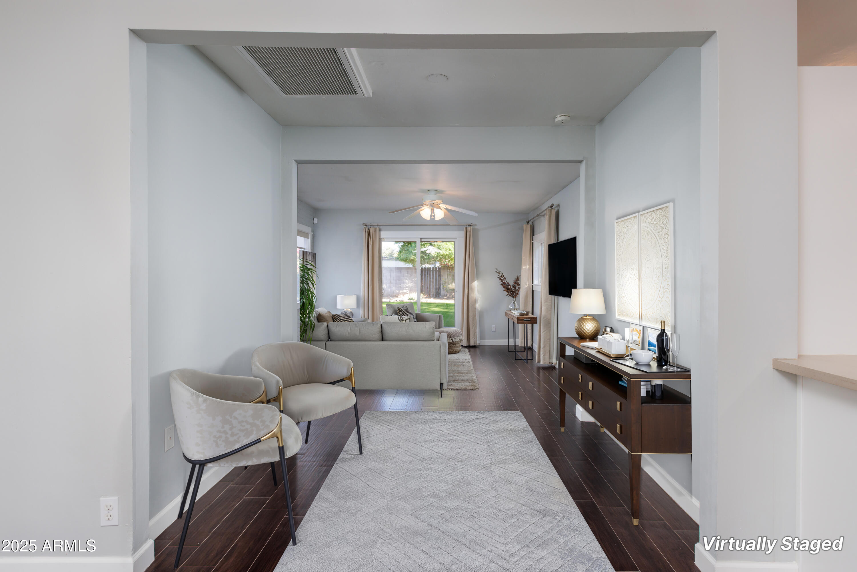 1621 North 16th Avenue Phoenix, AZ 85007 - Photo 6 of 32 a living room with furniture and a large window