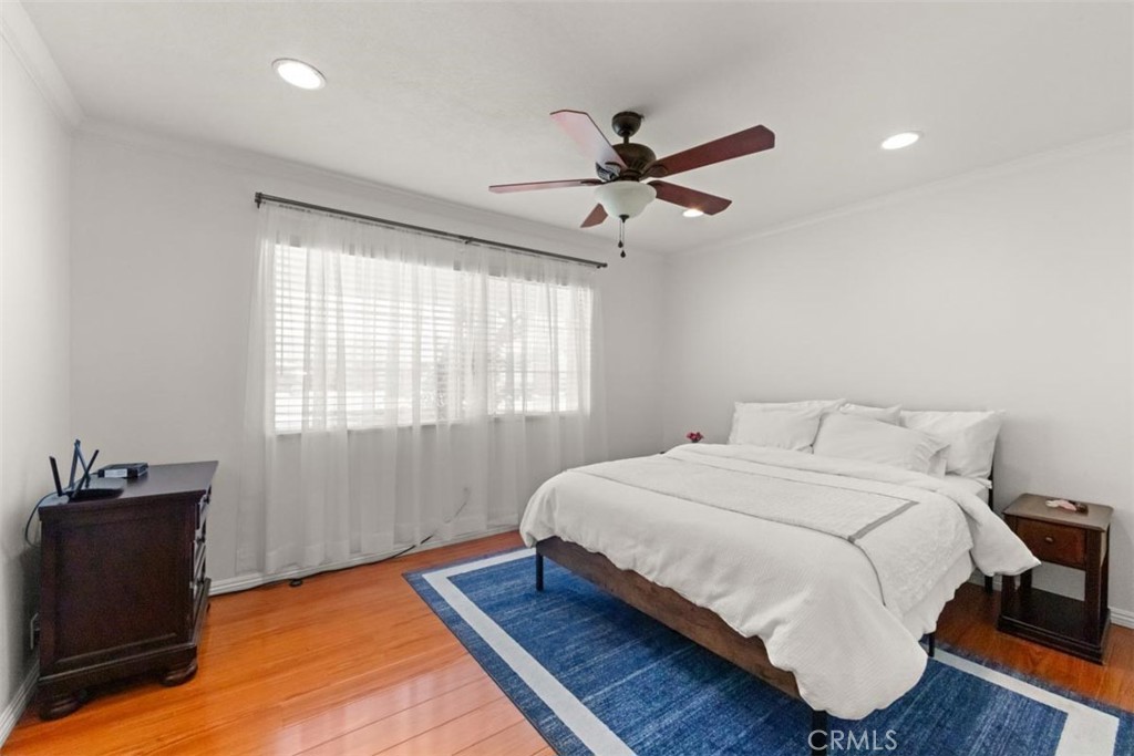 3275 Dalhart Avenue Simi Valley, CA 93063 - Photo 16 of 41 a bedroom with a bed and a window