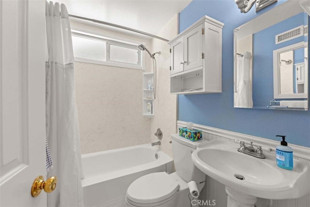 3275 Dalhart Avenue Simi Valley, CA 93063 - Photo 23 of 41 a bathroom with a sink toilet and shower