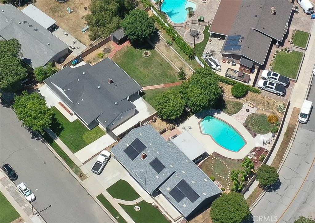 3275 Dalhart Avenue Simi Valley, CA 93063 - Photo 39 of 41 an aerial view of residential house with outdoor space and parking