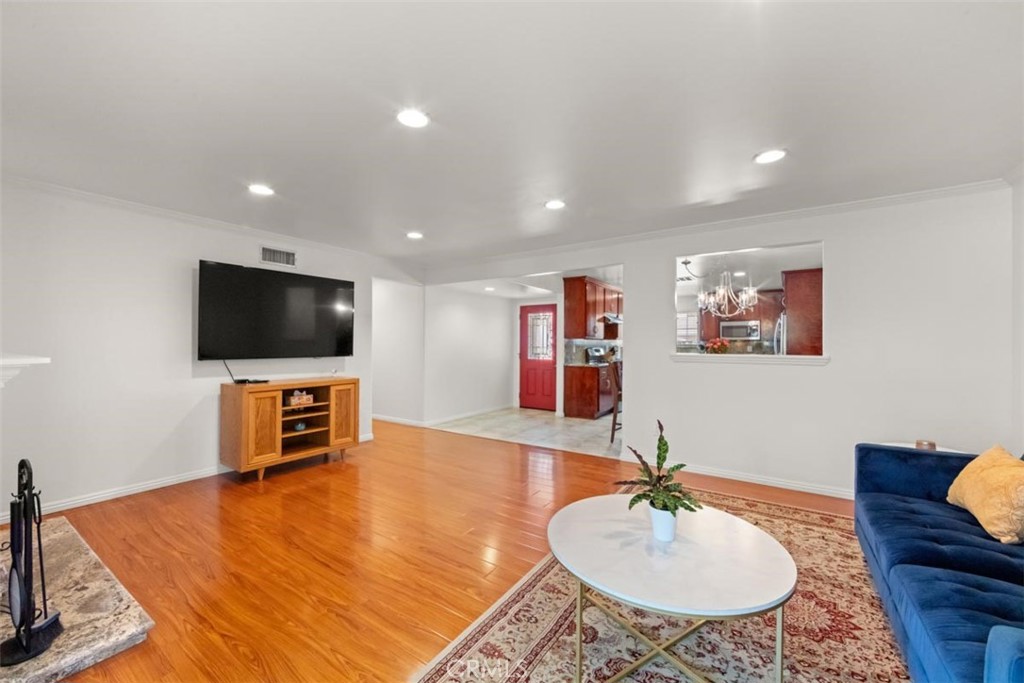 3275 Dalhart Avenue Simi Valley, CA 93063 - Photo 7 of 41 a living room with furniture and a flat screen tv