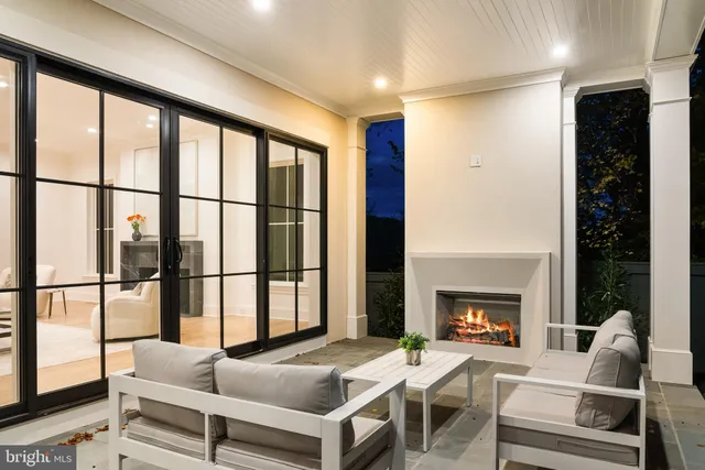 a outdoor living space with furniture and garden view