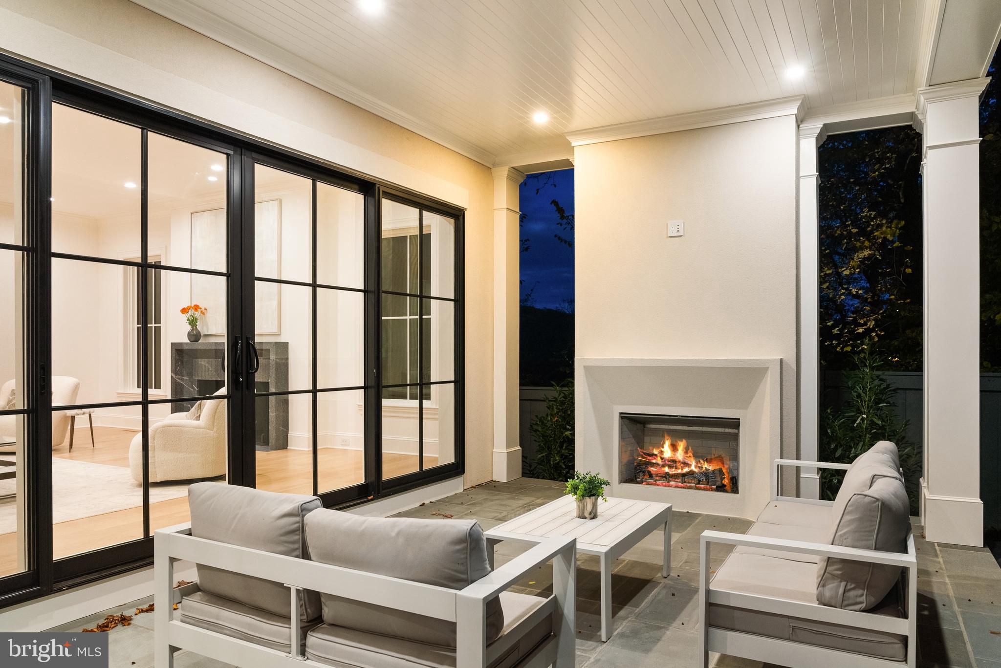 2916 Chesapeake Street Northwest Washington, DC 20008 - Photo 14 of 62 a living room with furniture a window and a fireplace