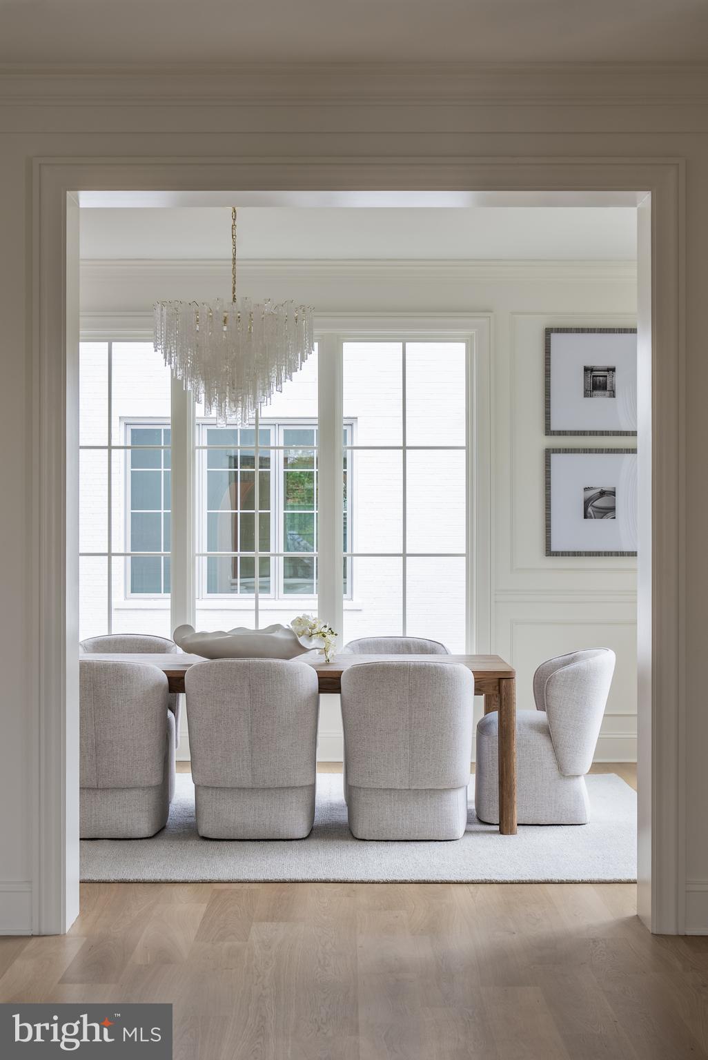 2916 Chesapeake Street Northwest Washington, DC 20008 - Photo 14 of 54 a living room with furniture and a chandelier