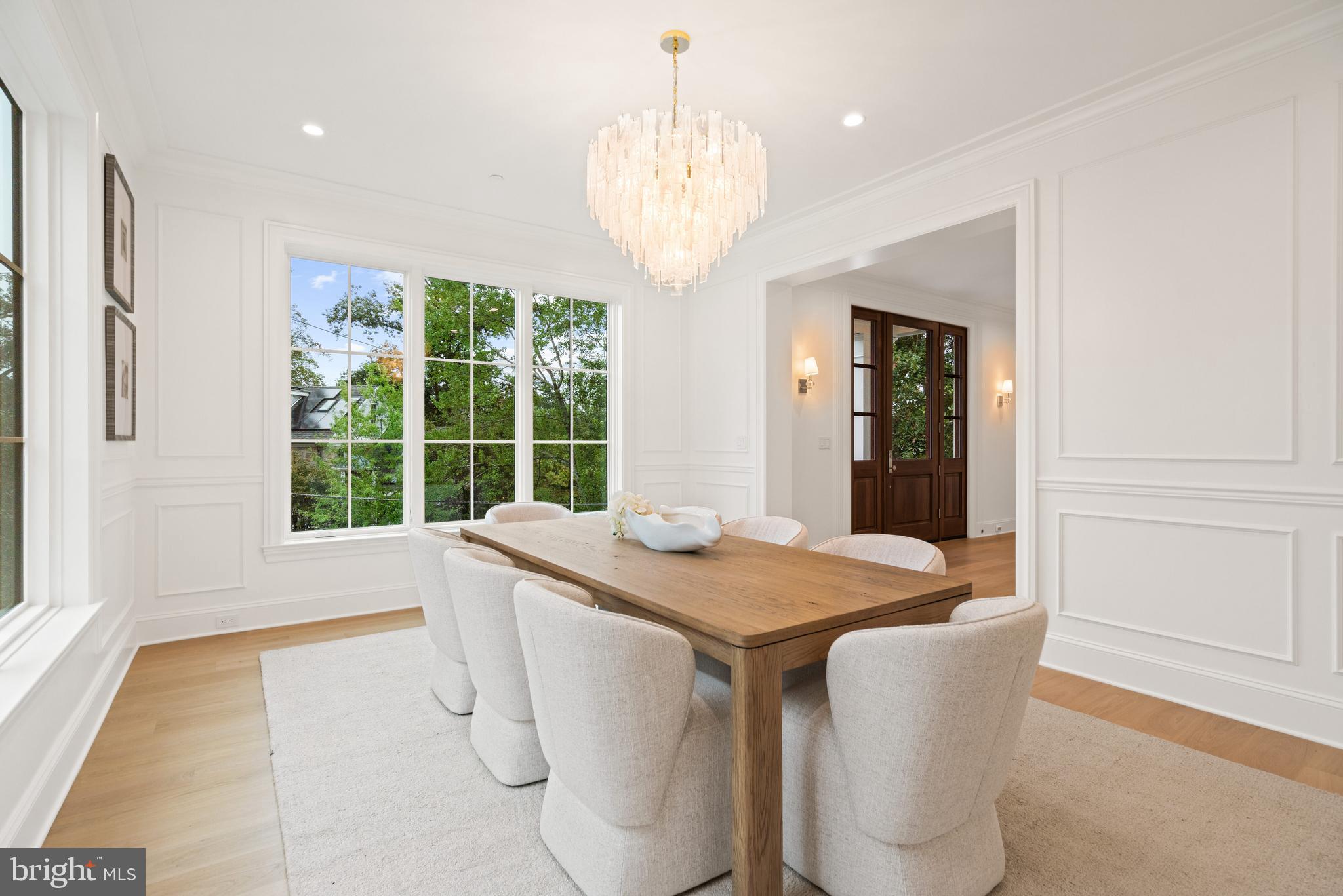 2916 Chesapeake Street Northwest Washington, DC 20008 - Photo 16 of 54 a dining room with stainless steel appliances granite countertop furniture and a large window