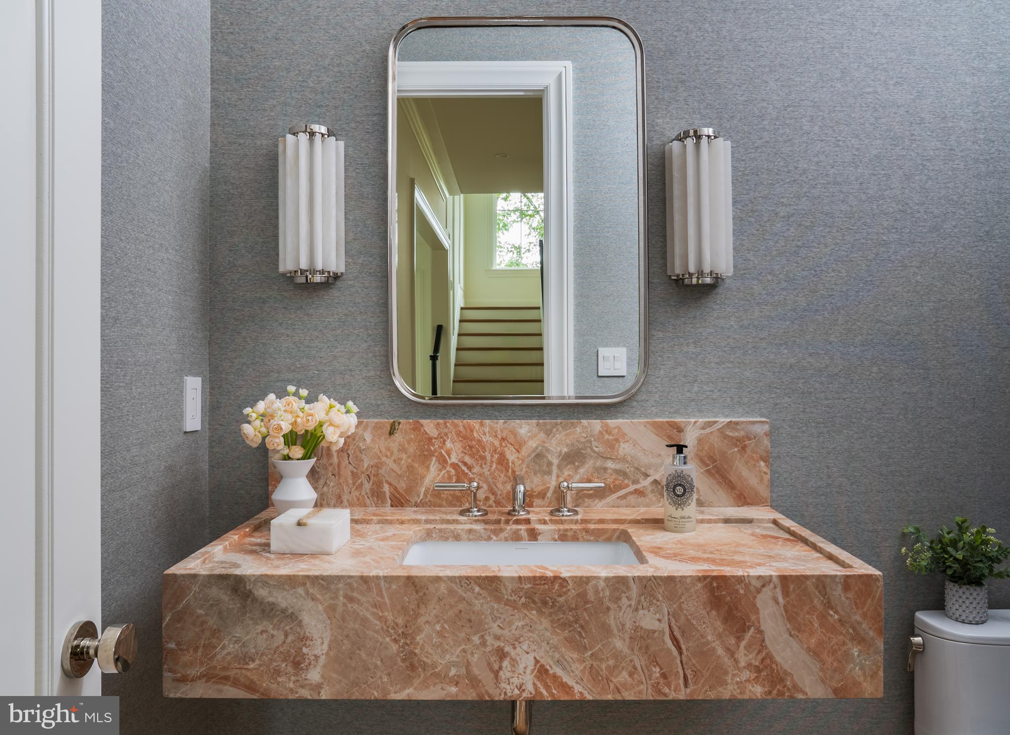 2916 Chesapeake Street Northwest Washington, DC 20008 - Photo 20 of 54 a bathroom with a sink and a mirror