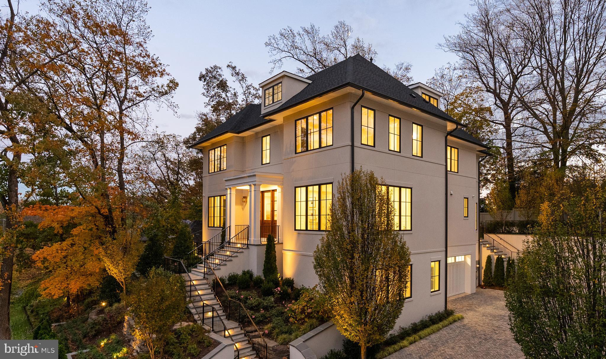 2916 Chesapeake Street Northwest Washington, DC 20008 - Photo 2 of 54 a front view of a house with a yard