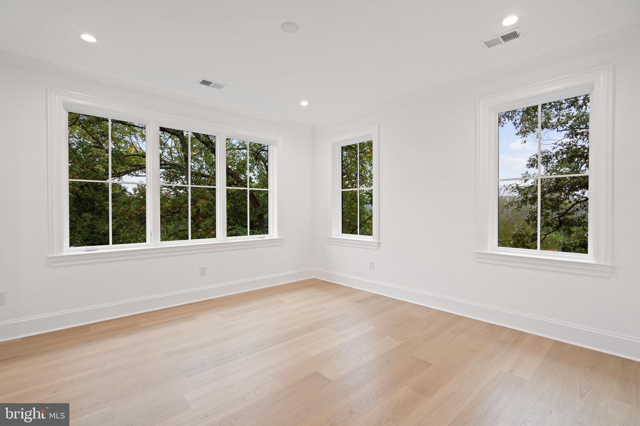 2916 Chesapeake Street Northwest Washington, DC 20008 - Photo 26 of 54 a view of an empty room with a window