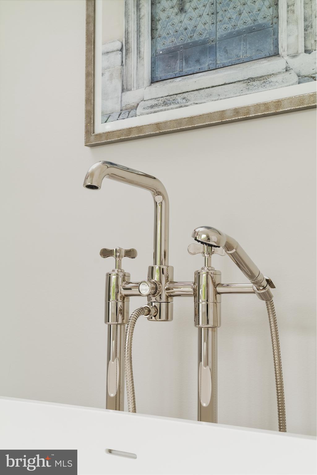 2916 Chesapeake Street Northwest Washington, DC 20008 - Photo 30 of 62 a bathroom with a sink and a mirror