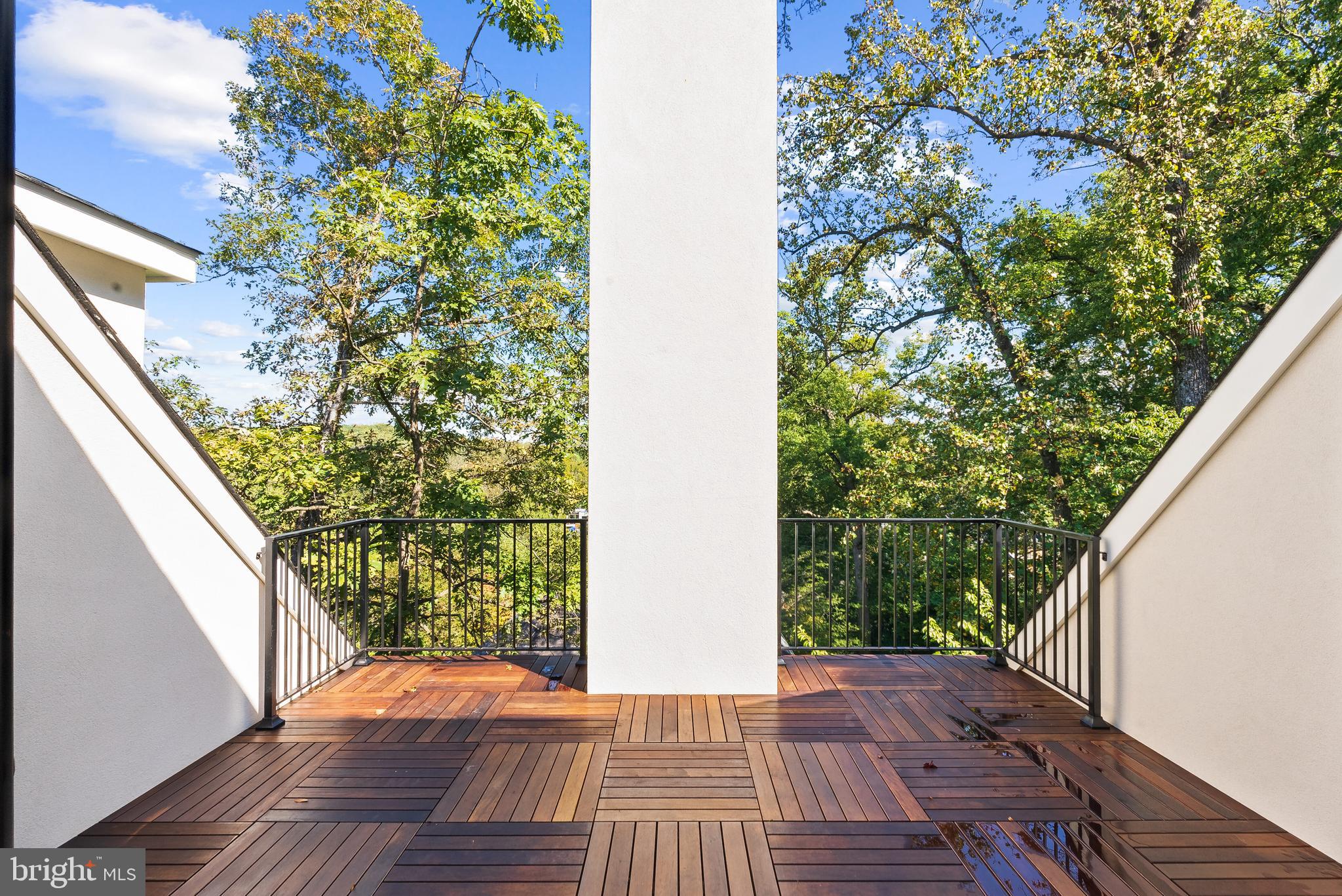 2916 Chesapeake Street Northwest Washington, DC 20008 - Photo 36 of 54 a view of balcony with wooden floor