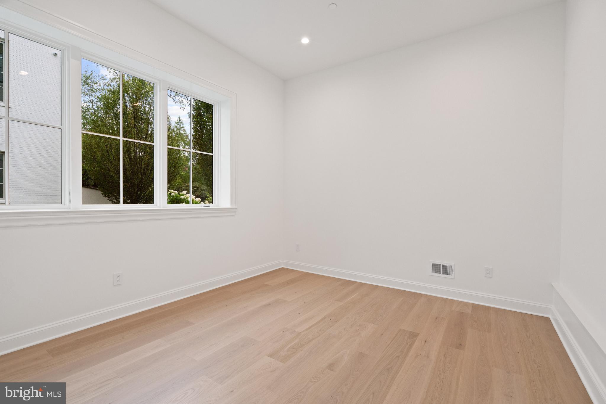 2916 Chesapeake Street Northwest Washington, DC 20008 - Photo 47 of 54 an empty room with a window