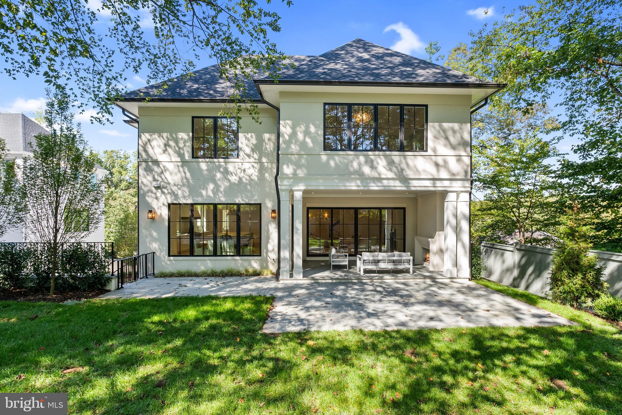 2916 Chesapeake Street Northwest Washington, DC 20008 - Photo 50 of 54 a front view of a house with garden