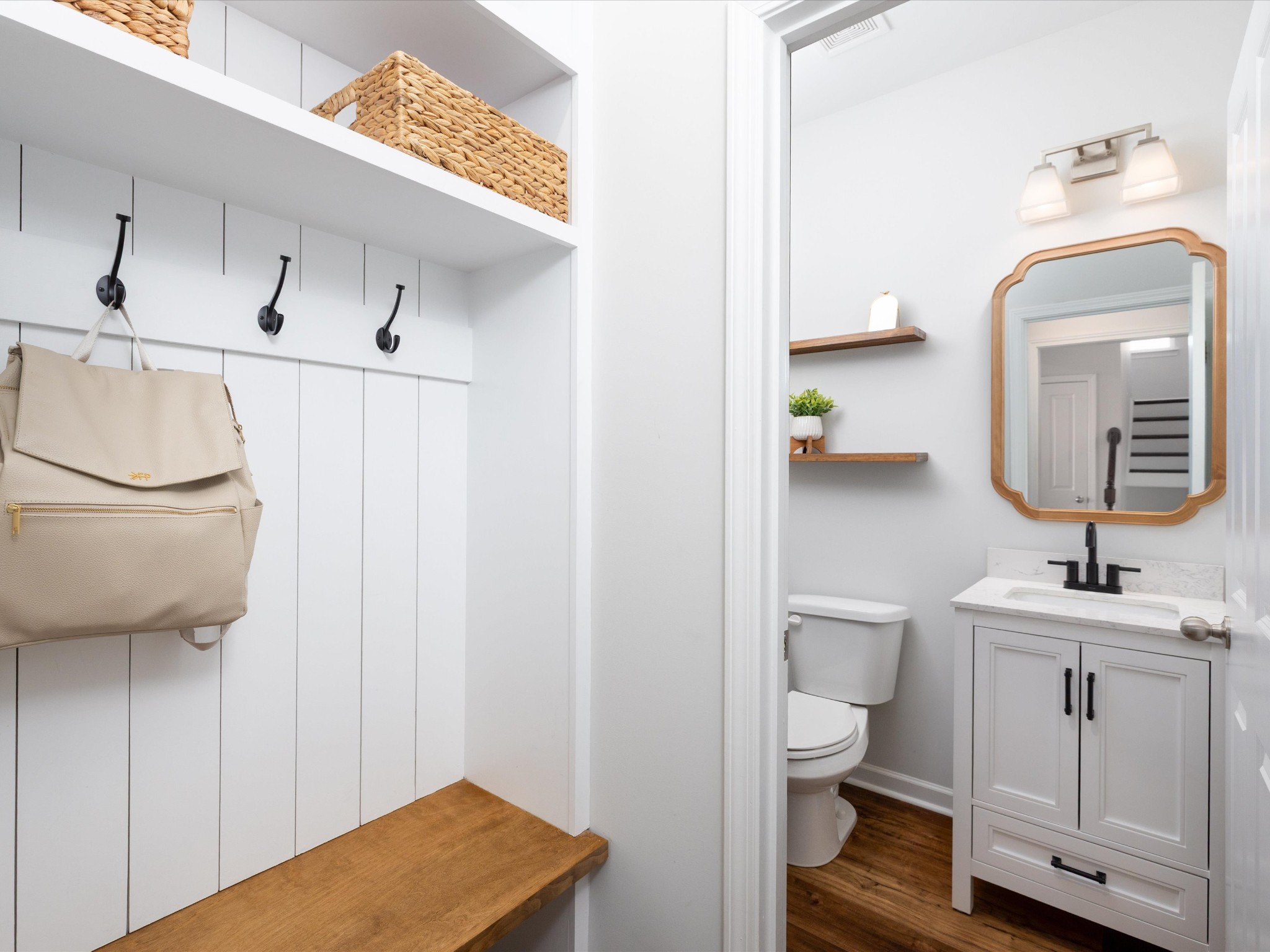 409 Rangeland Road Spring Hill, TN 37174 - Photo 25 of 75 a bathroom with a toilet sink and mirror