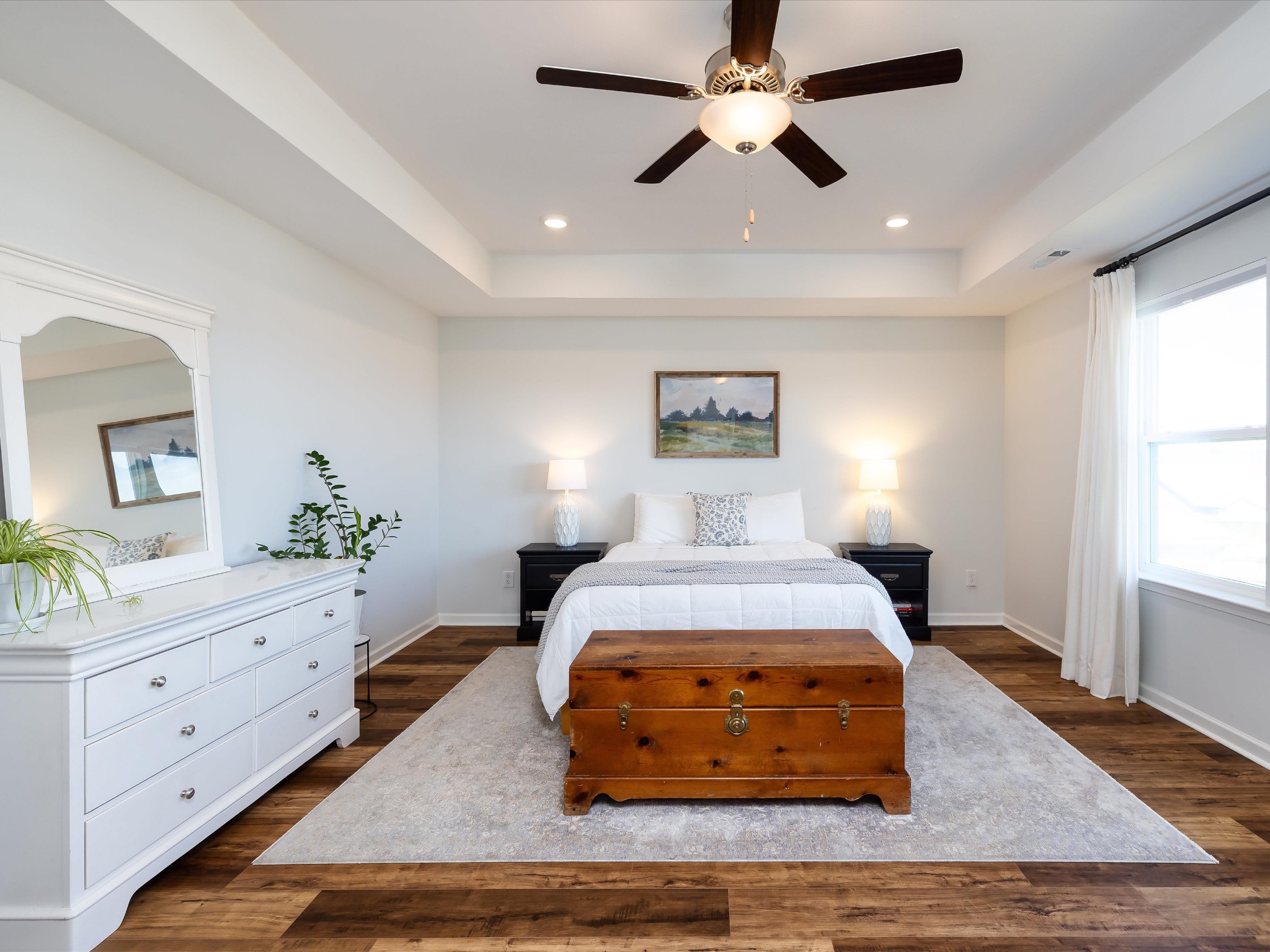 409 Rangeland Road Spring Hill, TN 37174 - Photo 32 of 75 a bedroom with a bed and wooden floor