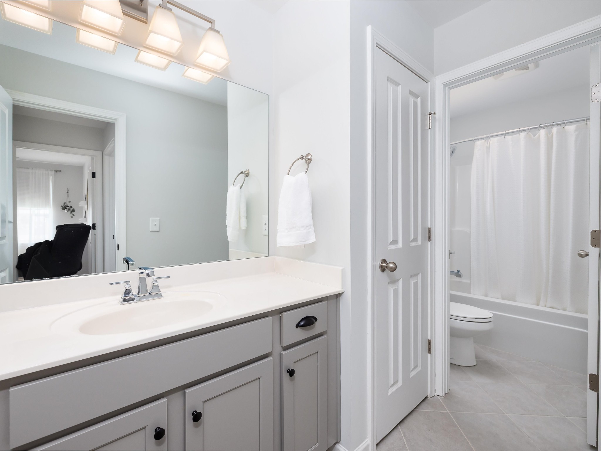 409 Rangeland Road Spring Hill, TN 37174 - Photo 46 of 75 a bathroom with a sink toilet and shower