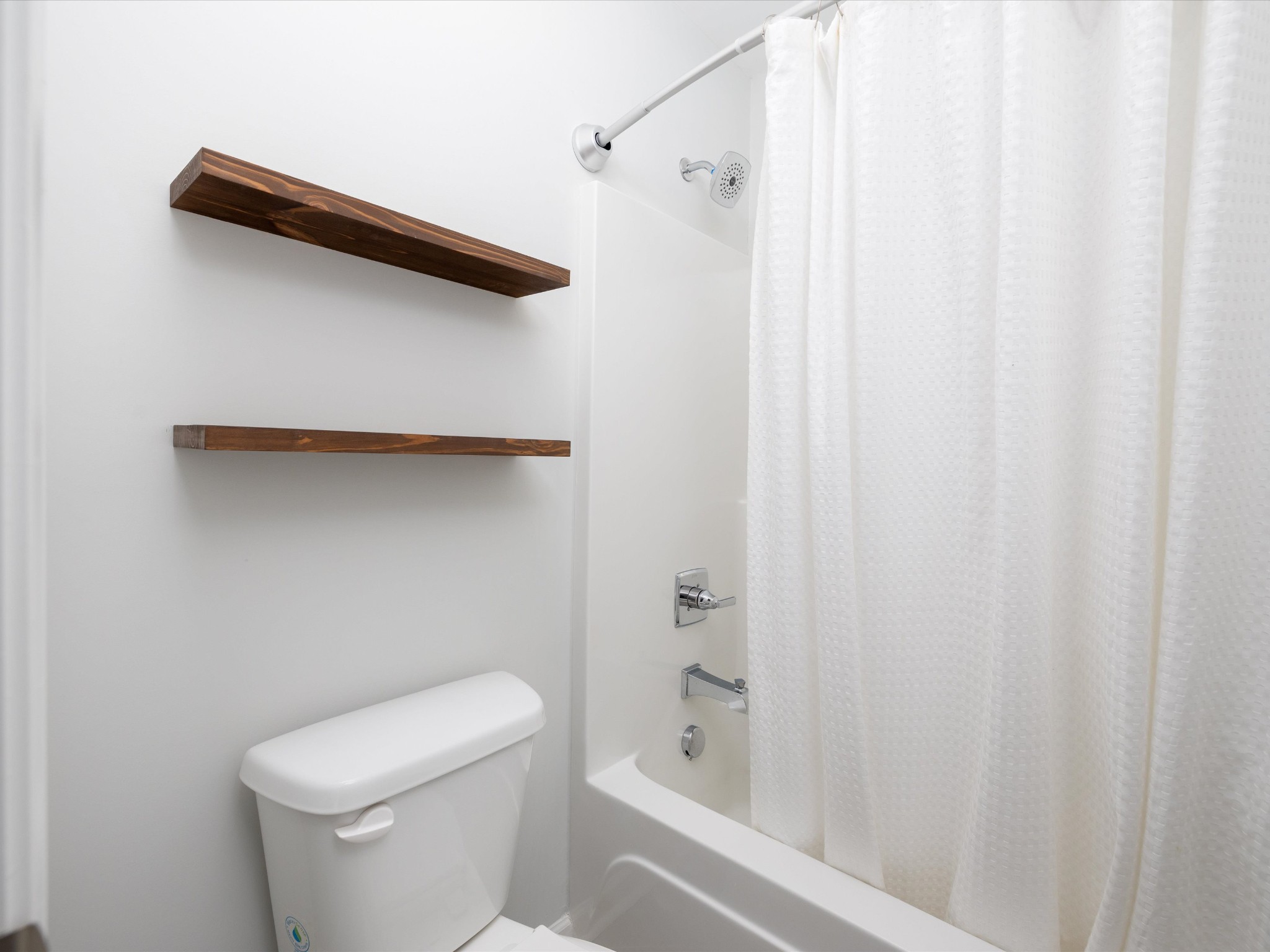 409 Rangeland Road Spring Hill, TN 37174 - Photo 47 of 75 a white toilet sitting next to a shower