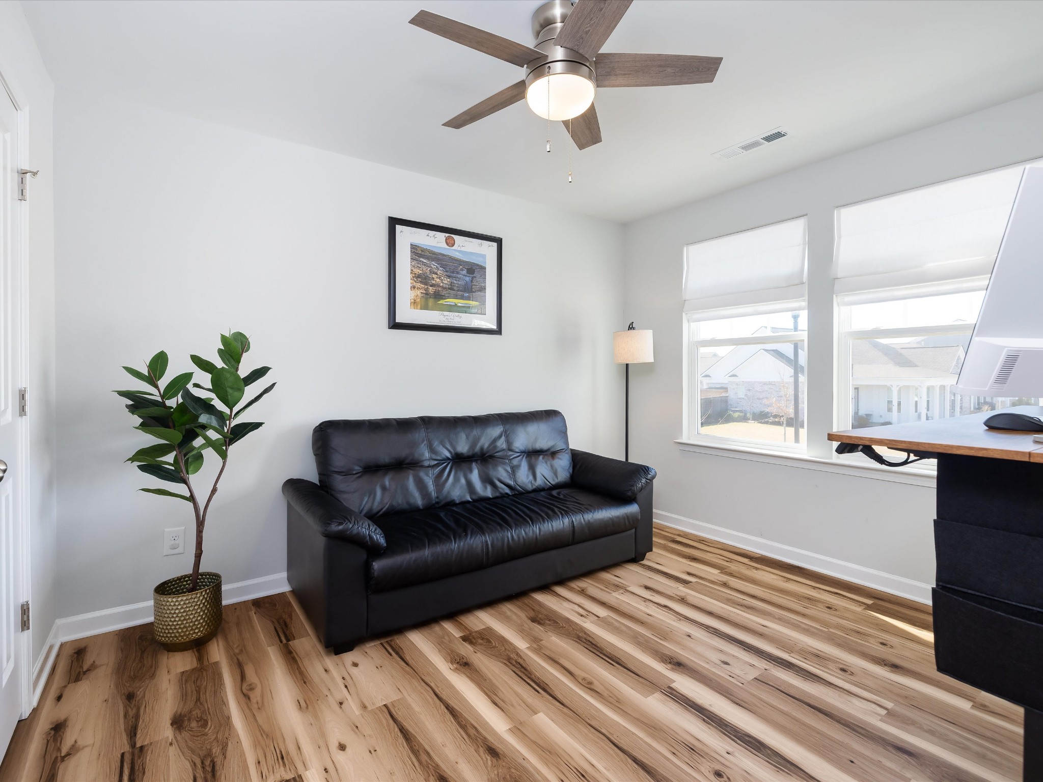 409 Rangeland Road Spring Hill, TN 37174 - Photo 48 of 75 a living room with furniture and a large window