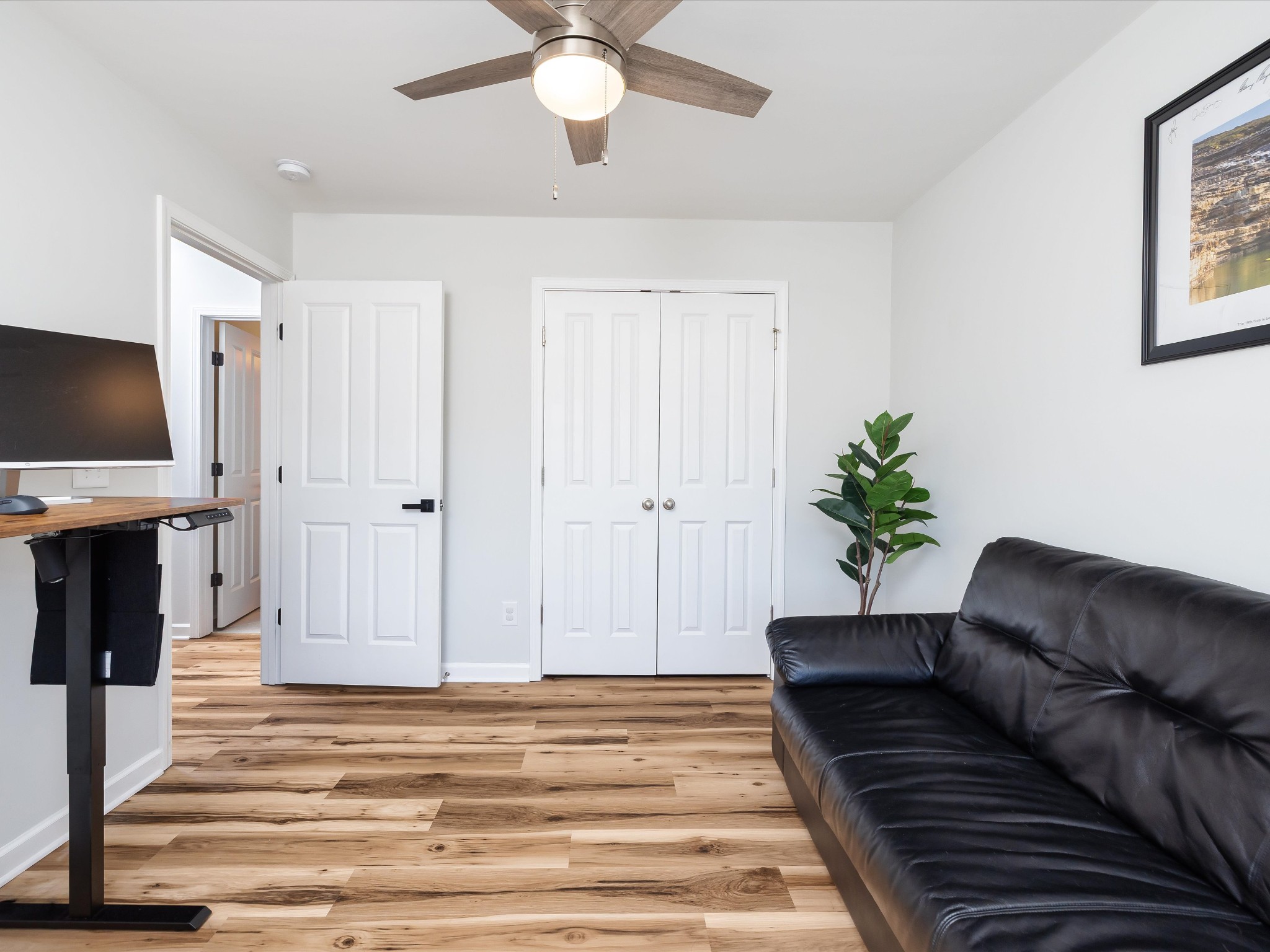 409 Rangeland Road Spring Hill, TN 37174 - Photo 50 of 75 a living room with furniture and a flat screen tv