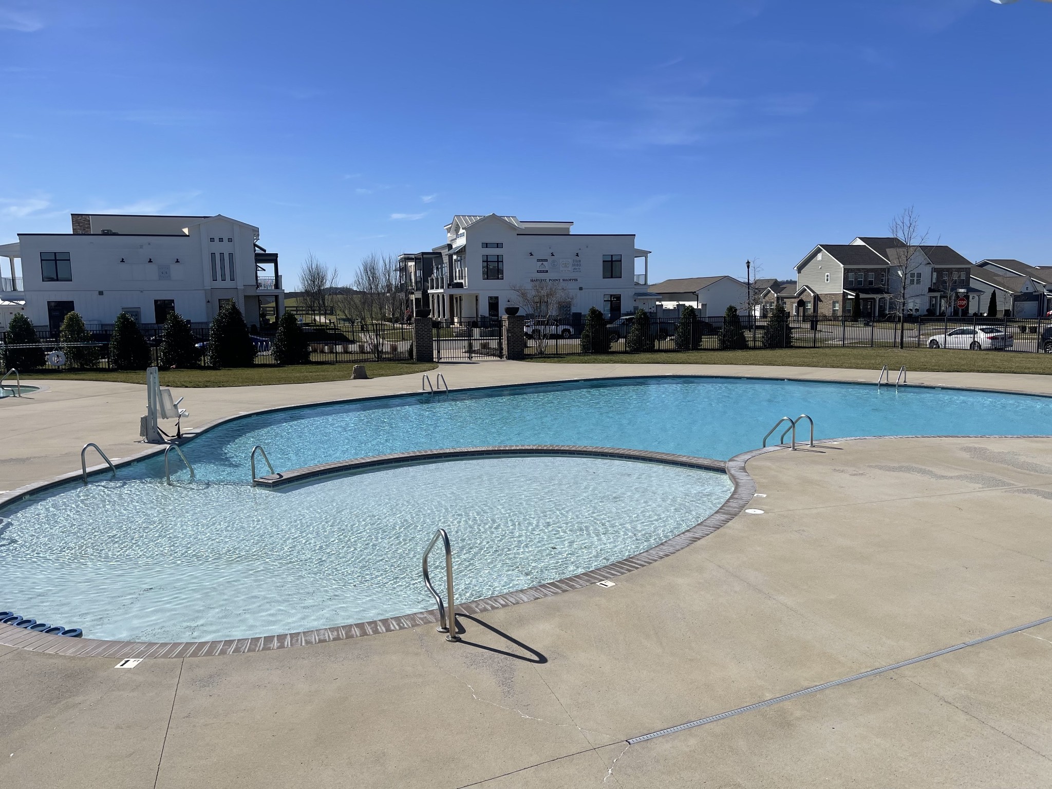 409 Rangeland Road Spring Hill, TN 37174 - Photo 66 of 75 a swimming pool with outdoor seating and city view