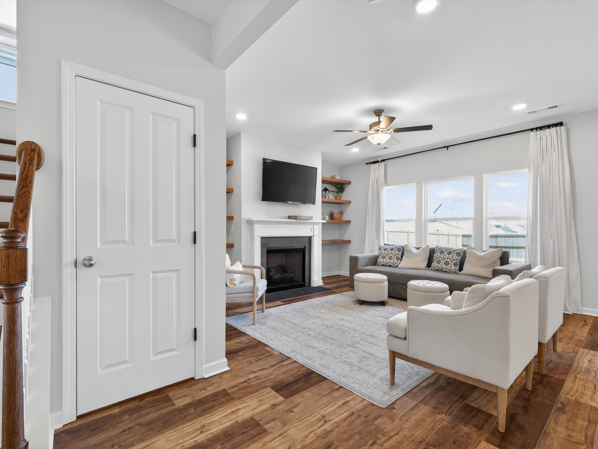 409 Rangeland Road Spring Hill, TN 37174 - Photo 7 of 75 a living room with furniture fireplace and flat screen tv