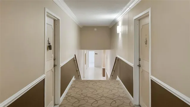 a view of a hallway with entryway