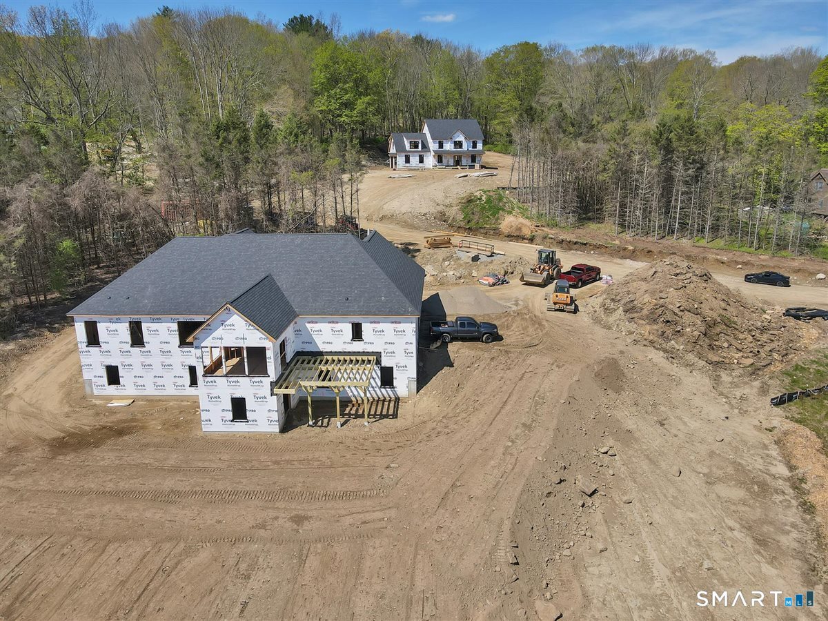 103 South Street Extension Coventry, CT 06238 - Photo 5 of 17 a view of a house with a road